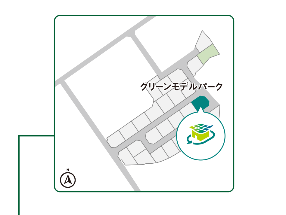 グリーンモデルパークの位置を示した区画図。住宅街の一角にあり、建物の配置が簡単に描かれています。地図の一部が強調され、太陽光発電をイメージしたロゴが表示されています。